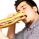 Illustration for article titled The Science Behind Why Men Eat More When Ladies Are Around